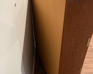 D79 - $60. Solid Wood Bookcase with Decorative Brass Braces at each Joint. Measures 36" wide x 9.25" deep x 42.5" tall. 