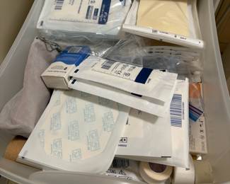 D126 - $30 - 3 Drawer cart of bandages / first aid supplies. 