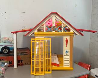 D167 - $60. 1982 Barbie Dream Cottage. Was played with and has stickers / residue but I don't see any broken pieces. 