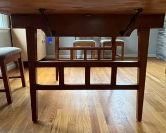 D33 - $175. Drop Leaf Dining Table with 5 Chairs. Measures 38" x 59.25" with drop leaves out x 30.5" tall. Each Drop Leaf is 16". Removable leaf is 14". All pieces are wooden - Chairs could use tightening up. Table top shows some wear. But a solid Vintage Set!