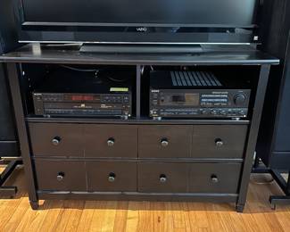D100 - $20. TV Console. Measures 44.5" wide x 17.5" deep x 31" tall. 4 Drawers all slide easily.  Pressed wood - in fair / good condition. 