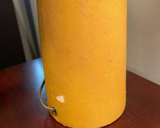 D67 - $30 PAIR of yellow leather wrapped lamps with Chrome accepts.  Leather has scratches/ marks, dents. Shows heavy use. Shades are ok. Measures 30.5" tall. 