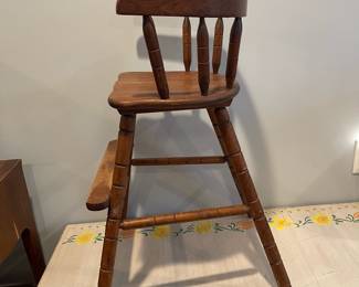 D72 - $20. Childs Wooden Highchair. Measures 19" wide x 19" deep x 30" tall. 