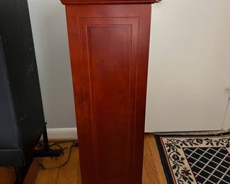 D45 - $50. Bombay Co. CD Cabinet. Doors on 2 sides to hide CDs. Shelves are not adjustable. Measures 12.5" x 13" x 37.5" tall. 