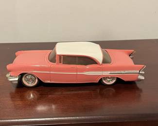 D95 - $30. 1957 Pontiac Starchief Hardtop Promo Car. Pink / Salmon & White. 