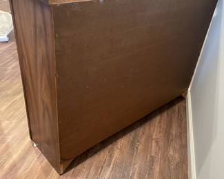 D69 - $30. Vintage Couch Table with Shelves. Measures 47" wide x 13" deep x 43.5" tall. Sturdy & Heavy! Wax paper is stuck inside on the bottom of the cabinet. 