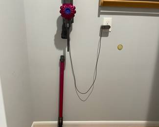 D13 - $75. Cordless Dyson Vacuum. Model V6. Has charger & attachments. 