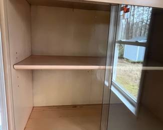 D1 - $500. Heywood Wakefield Vintage Hutch / Display Cabinet. Very good condition. Measures 32" wide x 17" deep x 65" tall. Moves in 2 pieces. Top Shelf is adjustable and so is the one in the bottom!