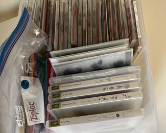 D136 - $30. Large Lot of Rubber Stamps in a Plastic Box. 