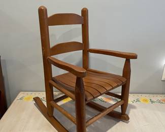 D71 - $25. Wooden Childs Rocker. Measures 14.5" wide x 12" deep x 23" tall. 
