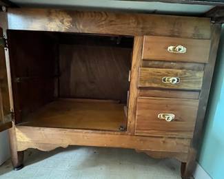 D180 - $275. Antique Hoosier Cabinet. Very good condition overall. Some pieces have been replaced but lots of original character! Measures 40" wide x 25" deep x 71" tall assembled. (Base is 33" Top is 38")