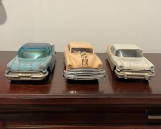 D97 - $65. Lot of 3 Promo Cars.  Left. 1954 Ideal Pontiac Star Chief Detroit Michigan. Middle 1954 Pontiac Chieftain Coupe Dealer Promo. Right - 1956 Johan Pontiac Star Chief Dealer Promo. 4 Door Hardtop.  