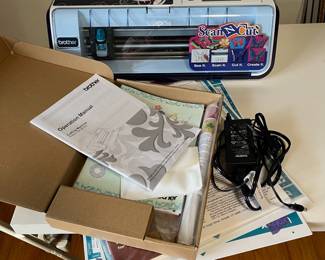 D134 - $80. Brother Scan N Cut (Model M250) Hobby Cutting Machine with Power Cord. 