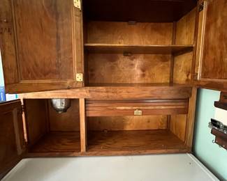 D180 - $275. Antique Hoosier Cabinet. Very good condition overall. Some pieces have been replaced but lots of original character! Measures 40" wide x 25" deep x 71" tall assembled. (Base is 33" Top is 38")