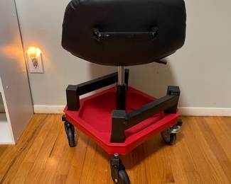 D26 - $60. Freeky Fit Rolling Shop Chair. Height is adjustable. Like new!