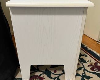D51 - $35. Single White Nightstand. Pressed wood - Drawers slide easily. Measures 23.5" x 15.75" deep x 21" tall. 