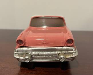 D95 - $30. 1957 Pontiac Starchief Hardtop Promo Car. Pink / Salmon & White. 