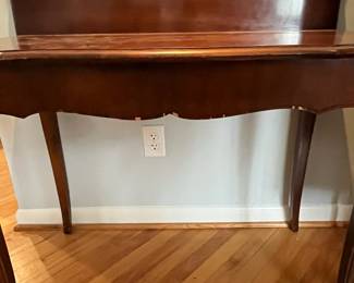 D44 - $60. Flip Top Game Table. Measures 41" x 21" deep x 30.5" tall. Has some veneer chipping. 