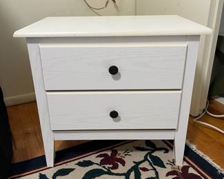 D51 - $35. Single White Nightstand. Pressed wood - Drawers slide easily. Measures 23.5" x 15.75" deep x 21" tall. 