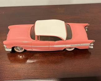 D95 - $30. 1957 Pontiac Starchief Hardtop Promo Car. Pink / Salmon & White. 