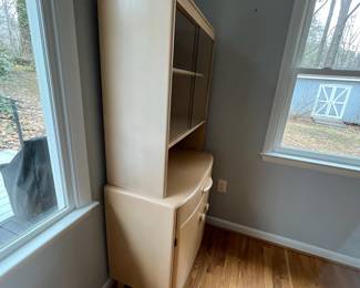 D1 - $500. Heywood Wakefield Vintage Hutch / Display Cabinet. Very good condition. Measures 32" wide x 17" deep x 65" tall. Moves in 2 pieces. Top Shelf is adjustable and so is the one in the bottom!