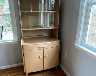 D1 - $500. Heywood Wakefield Vintage Hutch / Display Cabinet. Very good condition. Measures 32" wide x 17" deep x 65" tall. Moves in 2 pieces. Top Shelf is adjustable and so is the one in the bottom!