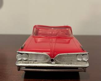 D92 - $50. 1959 Pontiac Bonneville 2 Door Convertible. Dealer Promo Car 1:25 scale. Sun visor is bent and there is a lot of wear on the Chrome accents.  