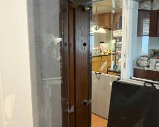 D31 - $85. Lighted Curio Cabinet with adjustable glass shelves. Measures 29" wide x 14" deep x 71" tall. Moves in 1 piece. 