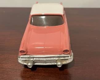 D95 - $30. 1957 Pontiac Starchief Hardtop Promo Car. Pink / Salmon & White. 