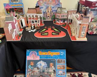 D17 - $75 SET. 1980s Disney Town Square. Good Played with condition. Most pieces are included, does NOT include any characters. Includes additional lighting system & Town Square Trolley. . Sears exclusive. 