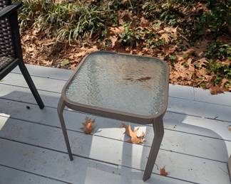 D132 - $10 Small metal/glass side table for patio. 