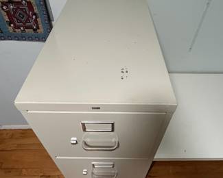 D28 - $25. Hon 4 Drawer Metal Filing Cabinet. Measures 15" wide x 25" deep x 48.75" tall. 