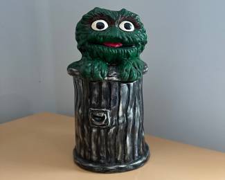 D163 - $50. Oscar the Grouch Ceramic Cookie Jar. Measures 11" tall. 