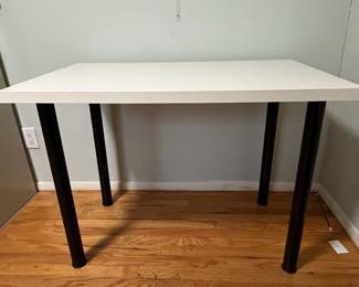 D29 - IKEA desk measures 29.5" x 23.75" x 29" tall. Sturdy but top has some damage. 