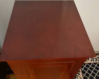 D45 - $50. Bombay Co. CD Cabinet. Doors on 2 sides to hide CDs. Shelves are not adjustable. Measures 12.5" x 13" x 37.5" tall. 