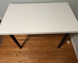 D29 - IKEA desk measures 29.5" x 23.75" x 29" tall. Sturdy but top has some damage. 