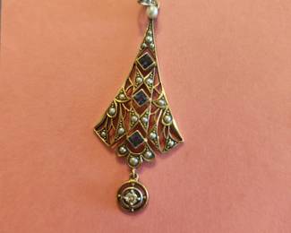Gold Pendant with Precious Stones. 