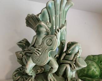 Frog Figurine playing their special frog tunes! 