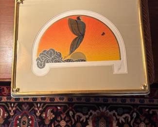 We're signed lithograph. Art Deco frame.