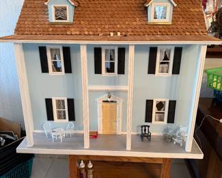 Furnished doll house on rotating table, House measures 39” x 22” x 28”