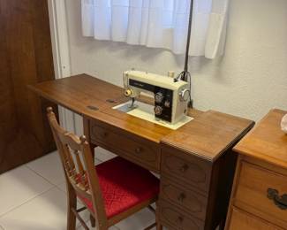 Kenmore sewing machine w/cabinet and chair