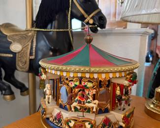 Electronic musical carousel, turns with music and lights