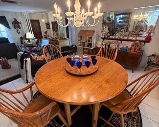 64” round oak drop leaf table with 4 Windsor style chairs
