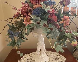 White Porcelain Cherub Urn with Floral Arrangement