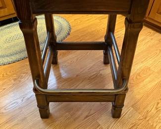 Red Tufted Leather Swivel Bar Stool with Carved Wood Accents third image