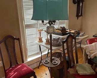 Vintage smoking stand floor lamp featuring a clock 