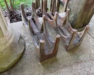 Cast iron log cradles