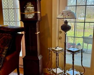 Grandmother clock & Victorian-style floor lamp