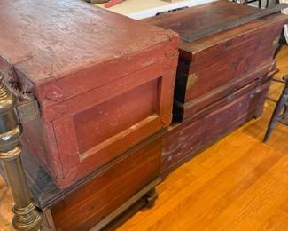 Four wooden trunks