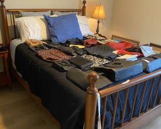 Purses galore. Many still have original price stickers ranging from $60 to 420.